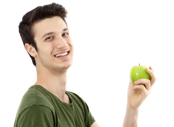 Young man eat green apple Stock Photo