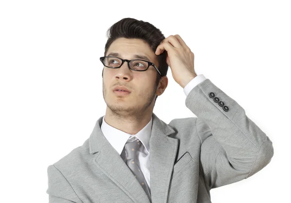 Young businessman scratching his head — Stock Photo, Image