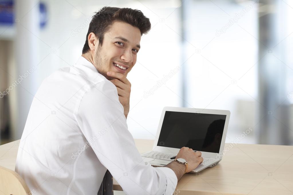 Businessman working computer in office