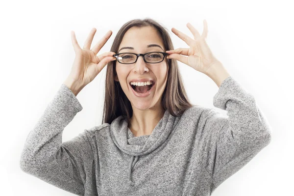 Jonge vrouw bedrijf brillen — Stockfoto