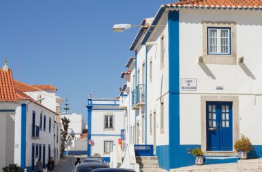 typical street in Ericeira Portugal clipart