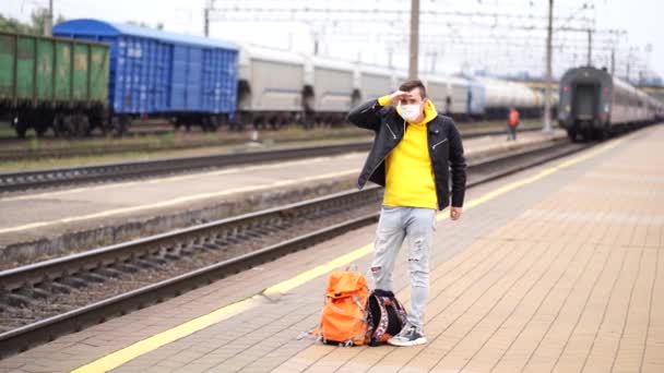 Man Medical Mask Stands Platform Waiting Train Male Passenger Protective — Stock Video