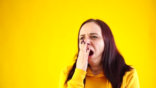 Close Young Woman Yawning Fatigue Yellow Background Portrait Tired Female — Stock Video