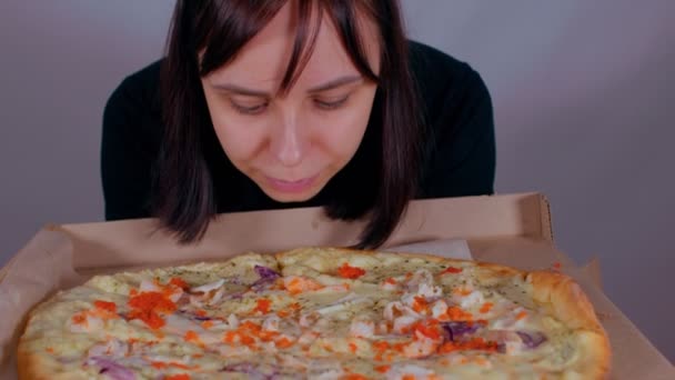 Close Young Woman Sniffing Appetizing Large Pizza Box Happy Female — Stock Video