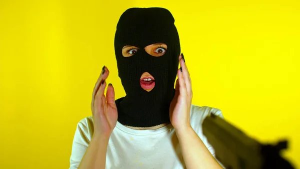 Unrecognizable Person Points Gun Dangerous Criminal Black Balaclava Yellow Background — Stock Photo, Image