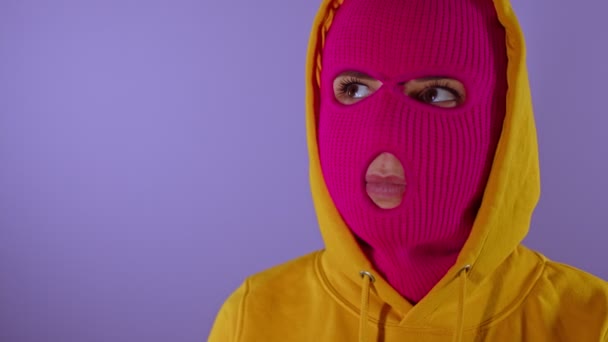 Close Young Woman Pink Balaclava Yellow Hood Pondering Her Life — Stock Video