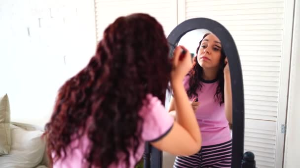 Young Beautiful Woman Pajamas Paints Her Eyelashes Mascara Looking Mirror — Stock videók