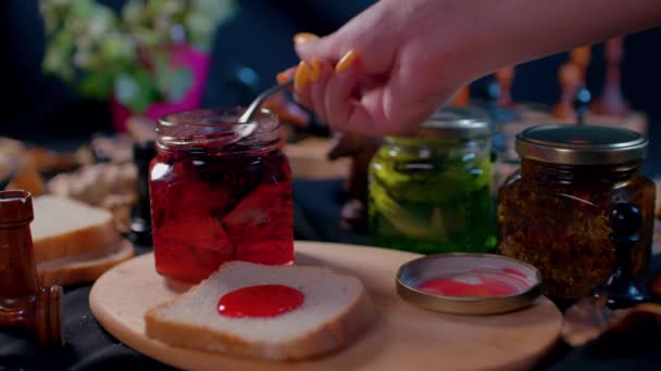 Close Small Jar Jam Piece Bread Wooden Board Unrecognizable Woman — Stock Video