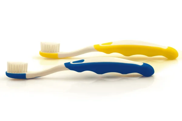 Dos cepillos de dientes de color — Foto de Stock