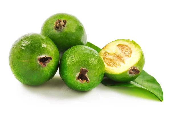 Feijoa with slice of fruit and green leaf — Stock Photo, Image