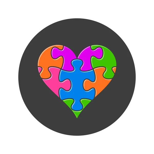 Coeur coloré fait de pièces de puzzle — Image vectorielle