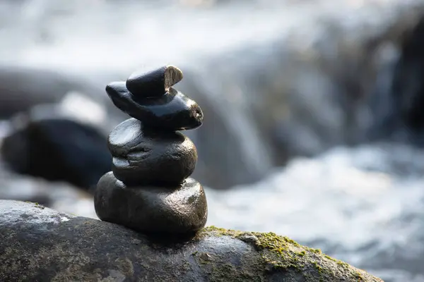 Stacked stones and The water flow through in a stream at wang nan pua, nan in thailand. — Stock Image Stacked Stones Water Flow Stream Wang Nan Pua Nan Thailand Royalty Free Stock Photos