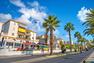 Cityscape of coastal residential district along seaside in resort town Benalmadena. Malaga province, Andalusia, Spain clipart