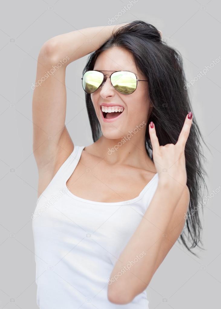 Woman  showing rocker gesture