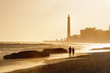 Maspalomas beach at sunset clipart