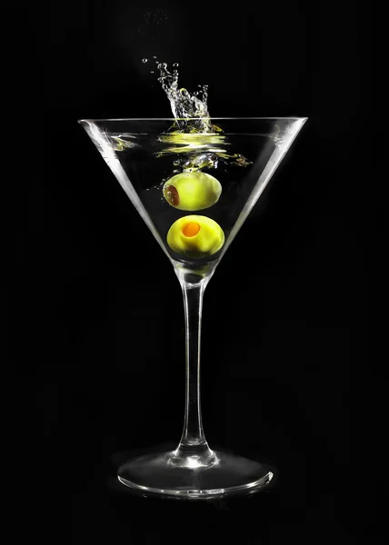 Green olive in martini glass — Stock Photo, Image