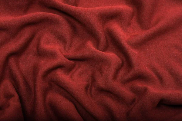 Pledy na tkaninie, dzianiny w kolorze czerwonym, zagięcia — Zdjęcie stockowe