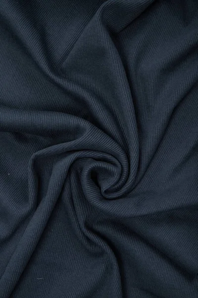 Πιέτες σε ύφασμα, πλεκτό υλικό σκούρου γκρι χρώματος, πτυχώσεις — Φωτογραφία Αρχείου