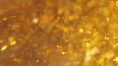 Renk bulanık ışık ve desenli soyut bokeh arkaplan. Açık sarı altın renkli arkaplan