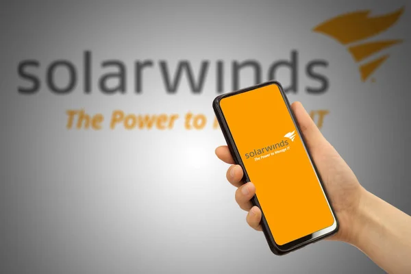 Solarwind Gezelschap Solarwind Technologie Logo Smartphone Scherm Hand — Stockfoto