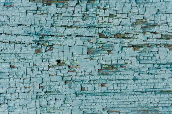 Старая краска текстура дерева фон. Синяя пилинговая краска на деревянной поверхности. — стоковое фото