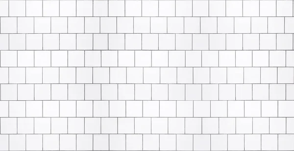 White tile background. Wall with white tiles for the interior of the kitchen or bathroom in the house. Decor, design and decoration of kitchen and bathroom interiors