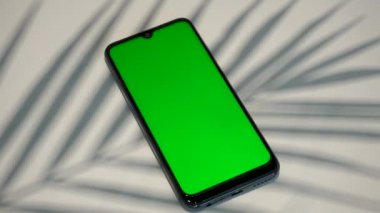 Telefon ekranı arkaplanı oluşturun. Boş boş akıllı telefonu arka planda, gölge avuç içiyle birlikte kullan 