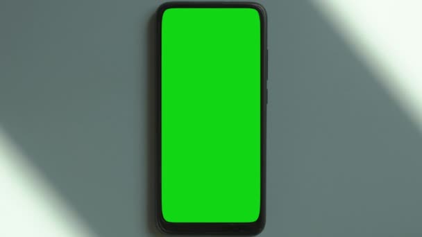 Mock up Telefon Bildschirm Hintergrund. Leeres leeres Smartphone auf dem Schreibtischhintergrund mit Schatten. — Stockvideo