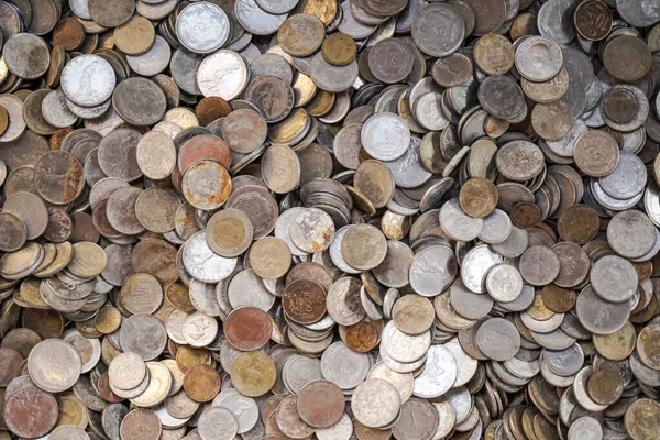 Old ancient coins background. Old ancient coins background. Many old copper coins in the chest as a symbol of wealth, money and treasure — Stock Photo, Image