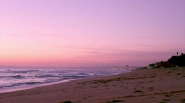Algarve - Dunas Douradas günbatımı, Portekiz.