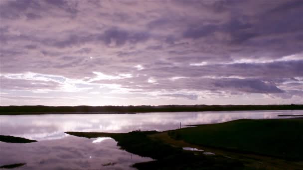 Ria Formosa 湿地でアルガルヴェ Qdl cloudscape 日没微速度撮影予約、ポルトガル南部、有名な自然先. — ストック動画