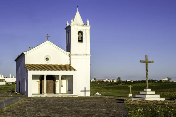 Church in Luz New Village, built in 2002 on a site selected by the community. The original village of Luz now lies submerged beneath the waters of the Alqueva dam — Stock Photo, Image