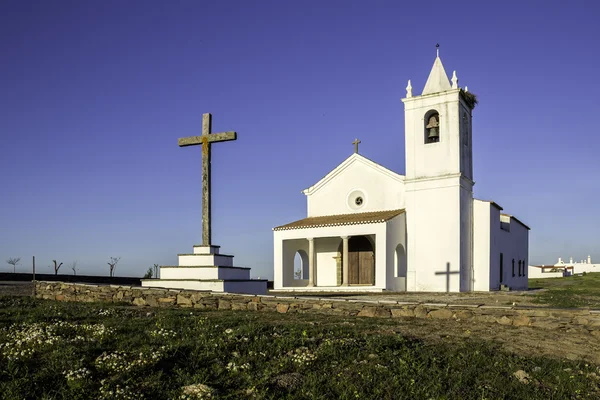 Church in Luz New Village, built in 2002 on a site selected by the community. The original village of Luz now lies submerged beneath the waters of the Alqueva dam — Stock Photo, Image