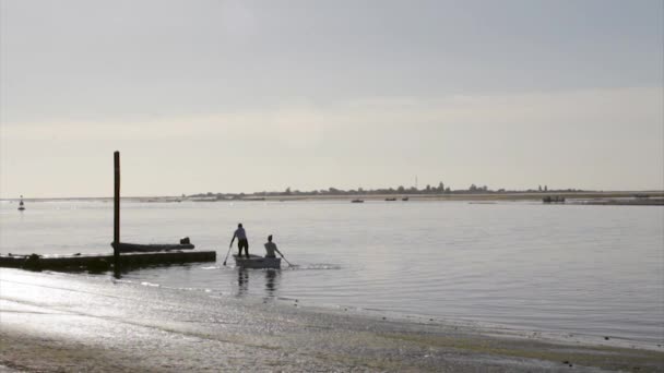 Landscape view from Olhão fishing port to Armona, one of the islands of Ria Formosa wetlands natural conservation region, Algarve, southern Portugal. — Wideo stockowe