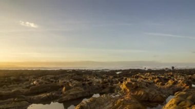 Zaman atlamalı Dar Bouazza Beach, Tamarist, Casablanca günbatımı Atlantik Okyanusu görünümü.