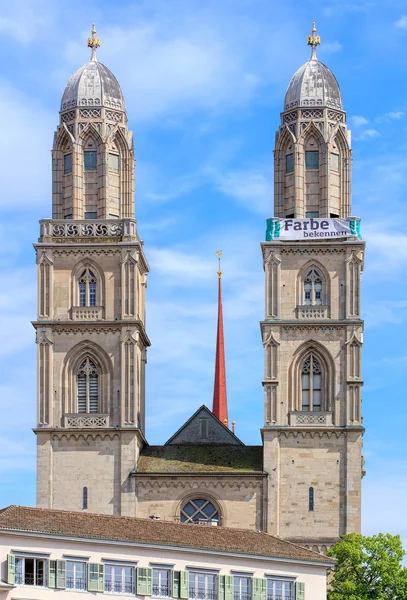 Towers of the Grossmunster with a banner — Stock Photo, Image