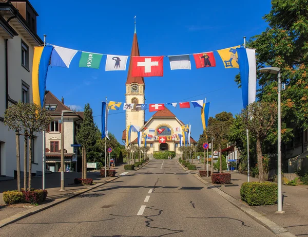 Street in Wallisellen, decorated with flags — Stock Photo, Image