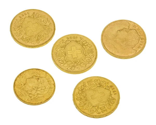 Швейцарський золоті монети ізольовані на білому — стокове фото