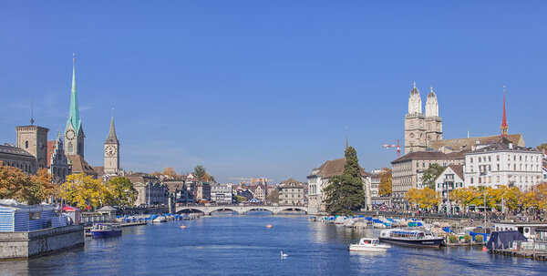 Zurich, Switzerland - 19 October, 2013: view along the Limmat river from the Quaibrucke bridge. Zurich is the largest city in Switzerland, it is also the capital of the Swiss canton of Zurich.