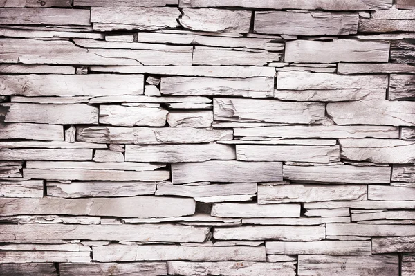 Rustic slate stone wall — Stock Photo, Image