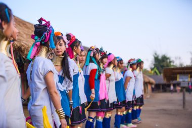 Tribal girls performing national dance clipart