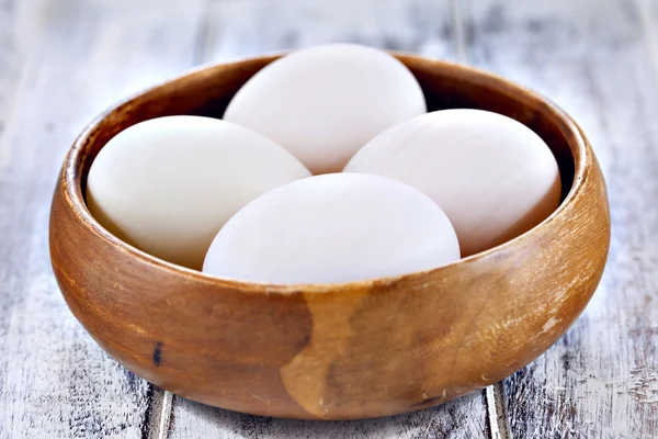 Duck eggs in brown wooden bowl — Stock Photo, Image