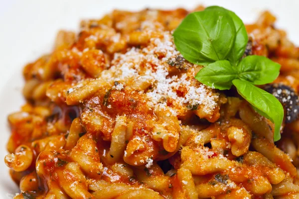 Gemelli pasta with tomato and zucchini sauce — Stock Photo, Image