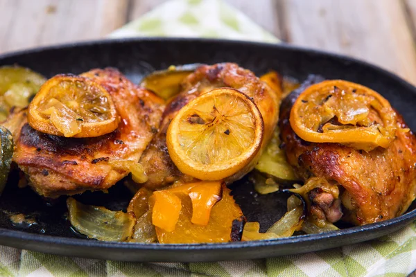Delicious baked chicken thighs — Stock Photo, Image
