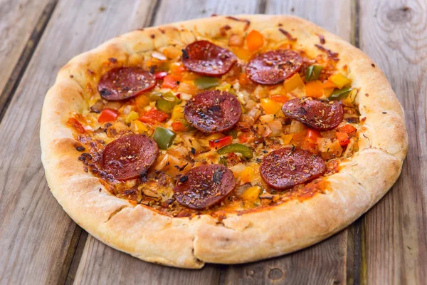 Delicious baked salami pizza — Stock Photo, Image