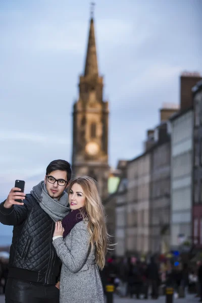 Attractive young couple making selfie — Stock Photo, Image