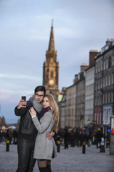 Attractive young couple making selfie — Stock Photo, Image