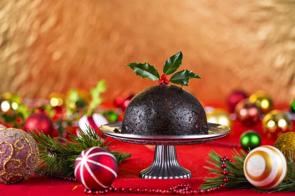 Christmas pudding in feestelijke instelling — Stockfoto