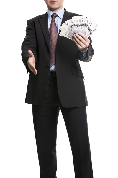 Un hombre de negocios irreconocible con traje oscuro muestra una extensión de 2 — Foto de Stock