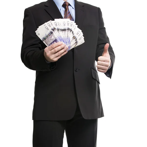 Some unrecognizable Businessman in suit showing a Spread of Poun — Stock Photo, Image